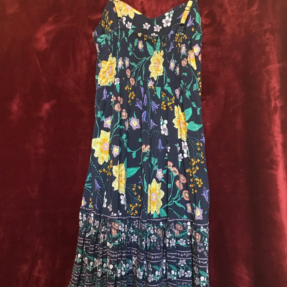 Bright little sundress offering fun summer fun!